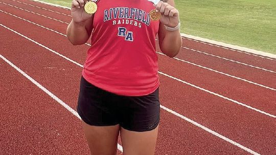 Hales shatters shot put records
