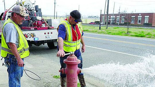 RFD inspecting hydrants for routine maintenance