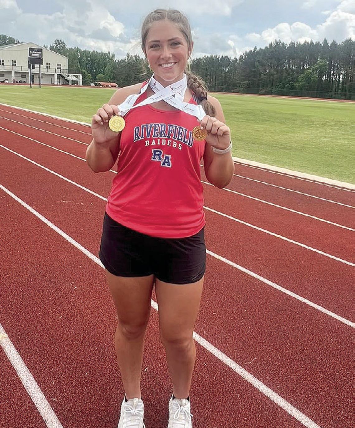 Hales shatters shot put records