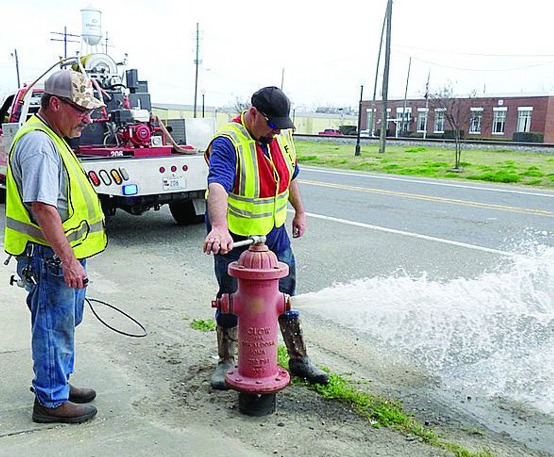 RFD inspecting hydrants for routine maintenance